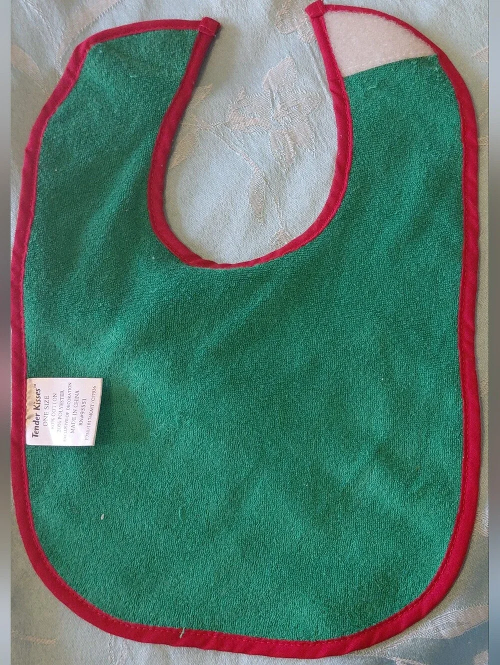 Tender Kisses Green Christmas Bib with Santa and Presents